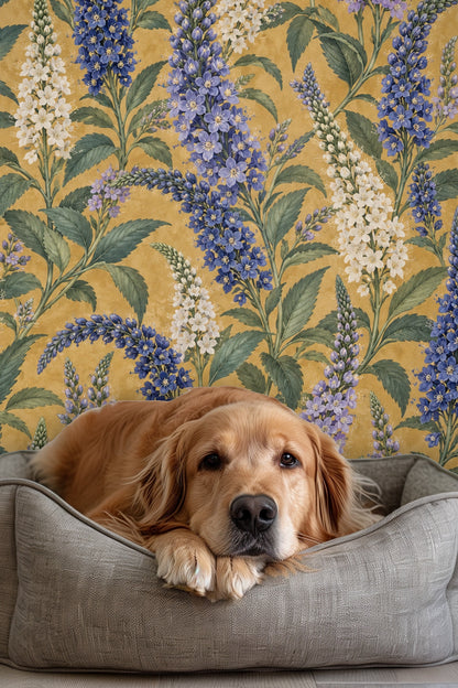 Wallpaper detail showing varied blue and white flower spikes with intricate leaf patterns on rich mustard yellow worn-textured background.