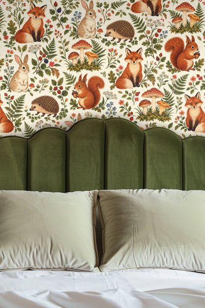 Woodland Reverie Wallpaper displayed in a kitchen setting with pitcher and dessert, highlighting warm animal and botanical motif