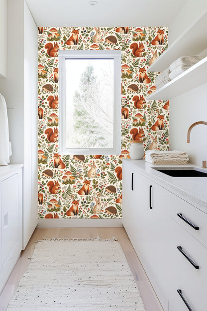 Arrangement highlighting soft beige rabbits surrounded by clustered wild berries and leafy foliage