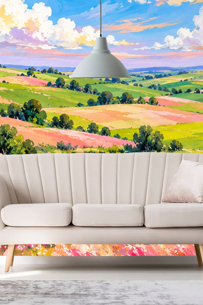 Colorful painterly landscape wallpaper featuring rolling fields, a lake, and a dramatic sky