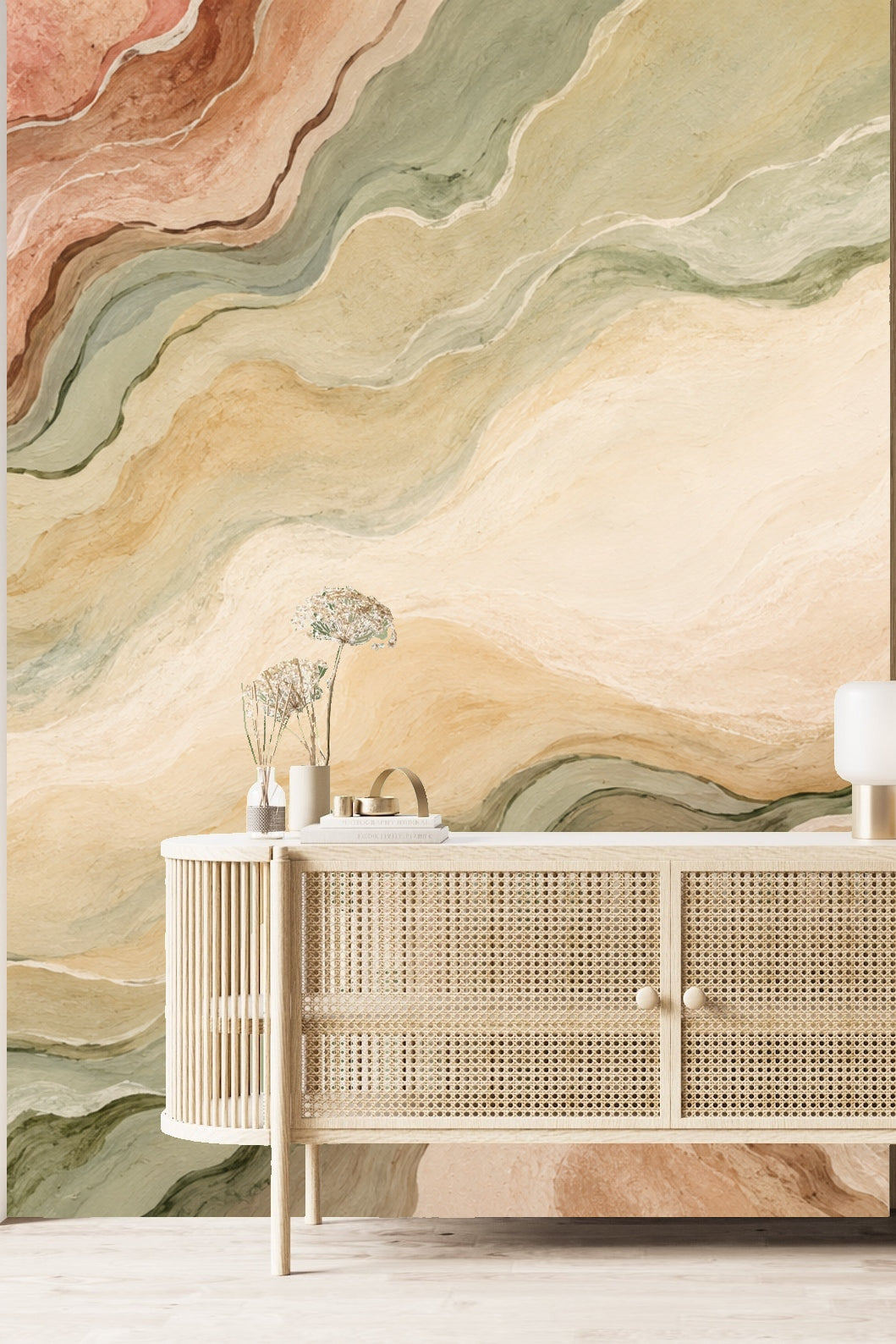 Muted ochre and green abstract wallcovering behind office setup