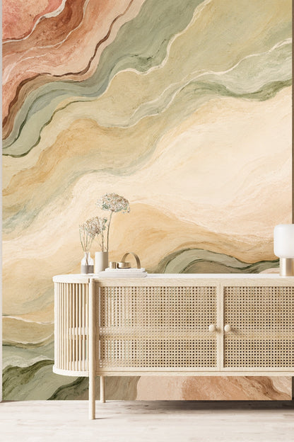 Muted ochre and green abstract wallcovering behind office setup