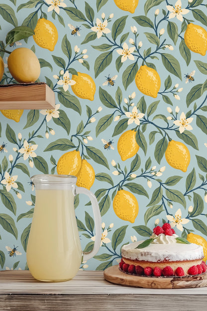 bees flying near white lemon blossoms on patterned wallpaper