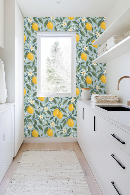 repeating botanical pattern of lemons and flowers on wallpaper