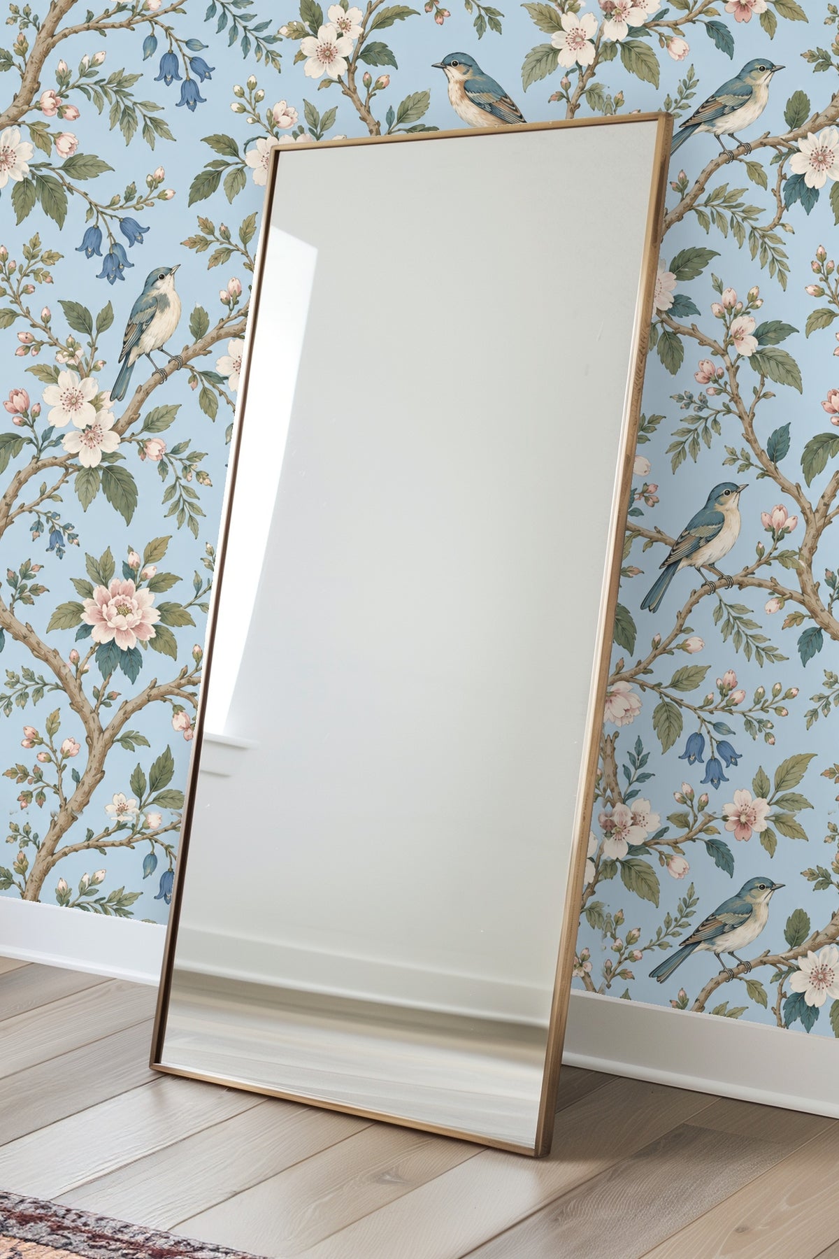 Close-up of delicate pink and white blossoms with green leaves on the wallpaper