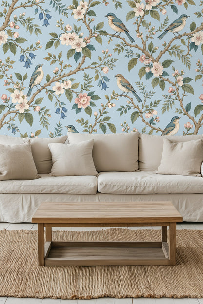 Wallpaper artwork featuring delicate bluebirds on blooming branches against a sky-blue background
