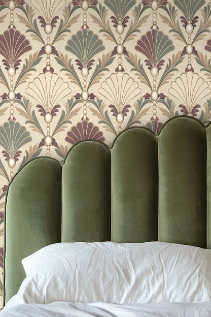 Detailed close-up of vintage shelled wallpaper with pearls in muted purple and green tones