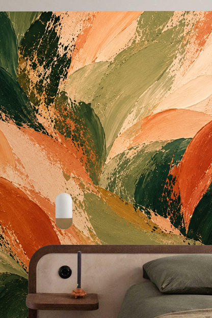 Wall detail showing large leaf motifs in layered brushstrokes above bedside sconce.