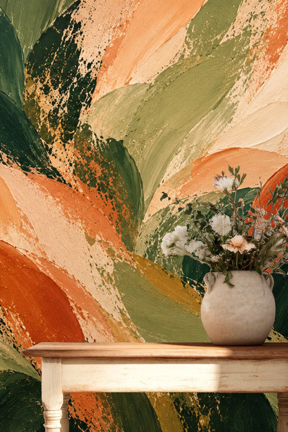 Artistic foliage wallpaper shown with minimal furniture for scale.
