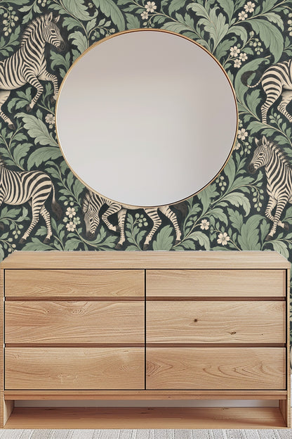 Zebra standing with head turned on wallpaper with leafy pattern