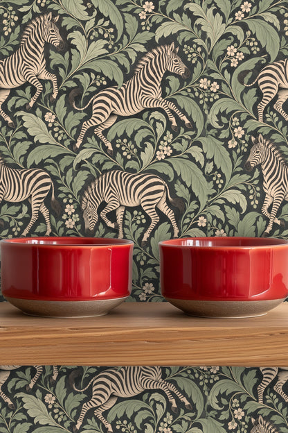 Zebras in playful poses surrounded by swirling green leaves and small flowers