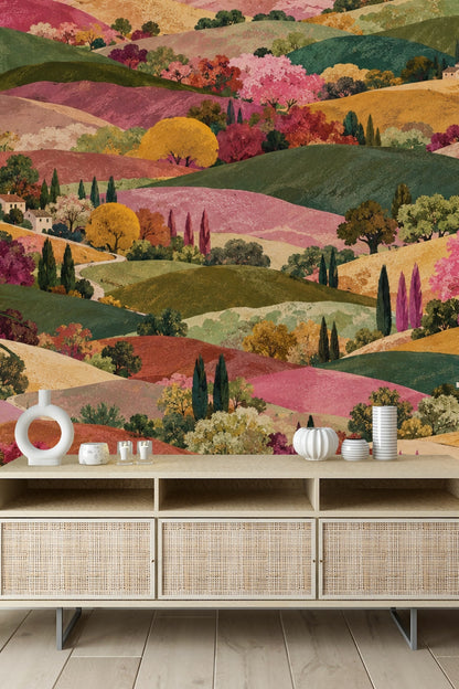 Partial view of a soft pink and golden hill blending into forested green sections