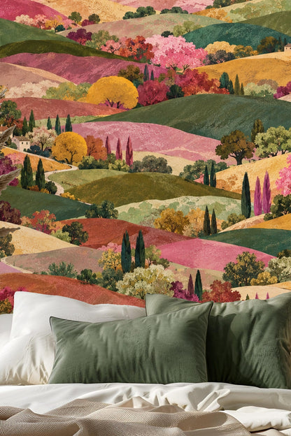 Detail of villa rooftops nestled among colorful hills and cypress clusters