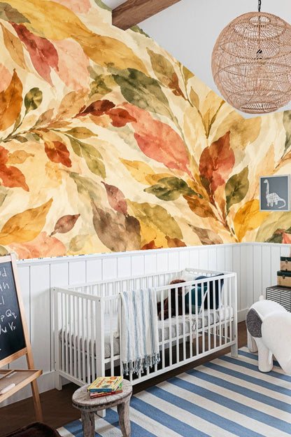 Close-up detail of watercolor leaf pattern with rich amber and muted green shades