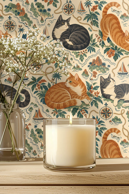 Illustrated wallpaper detail showing orange tabby cat stretching among tropical leaves and compass roses