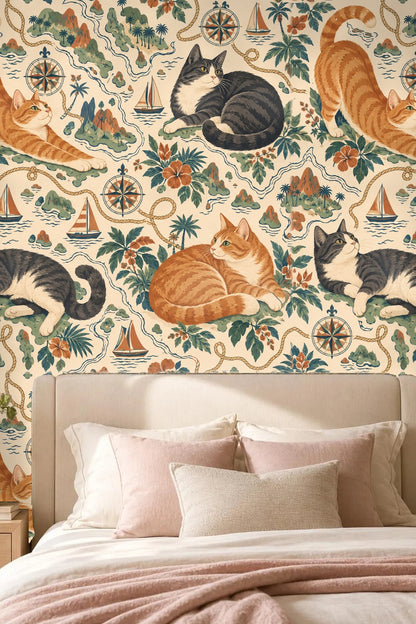 Decorative wallpaper with cats surrounded by tropical leaves, compass roses, and boats