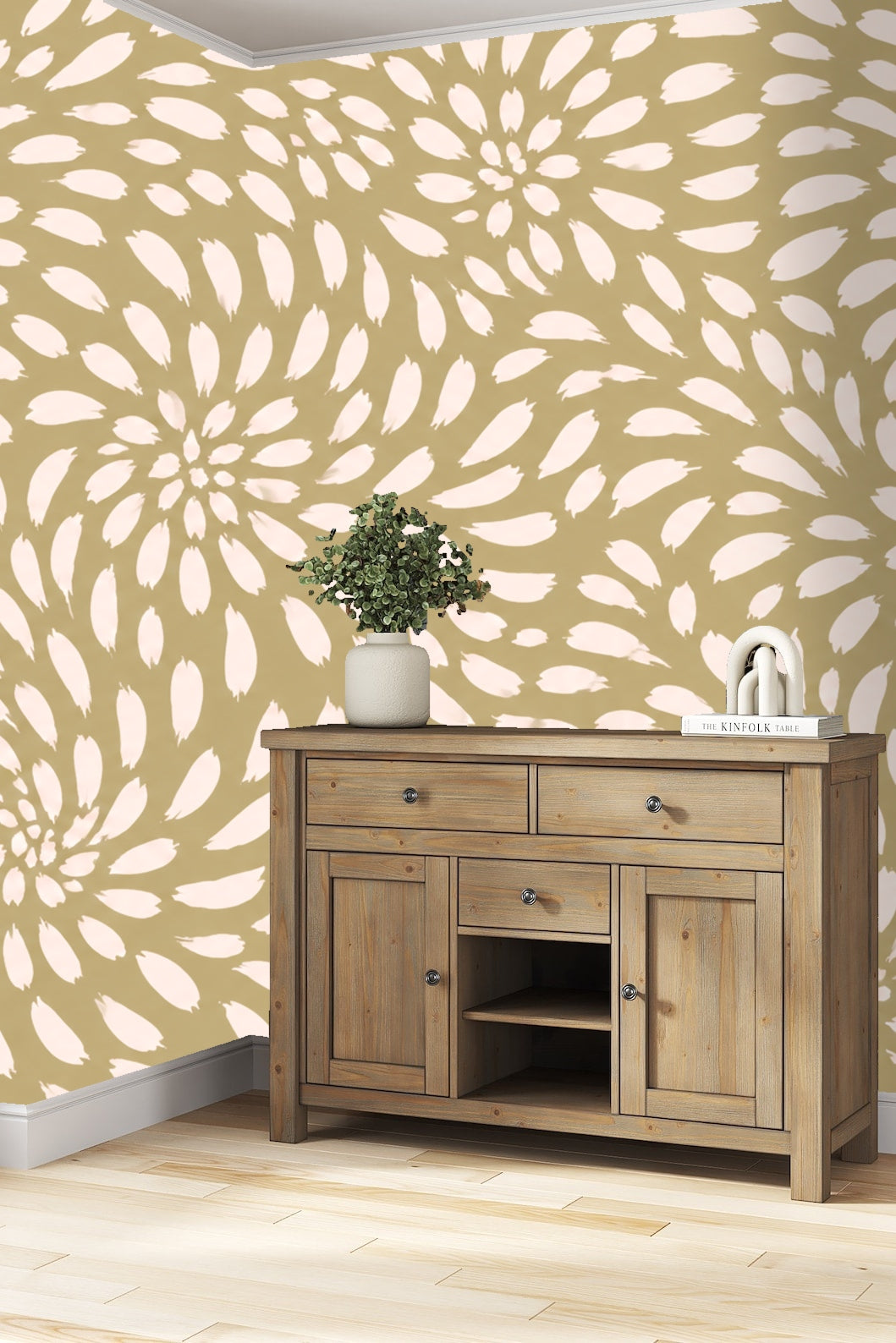 Natural light illuminating the blush and taupe floral wallpaper