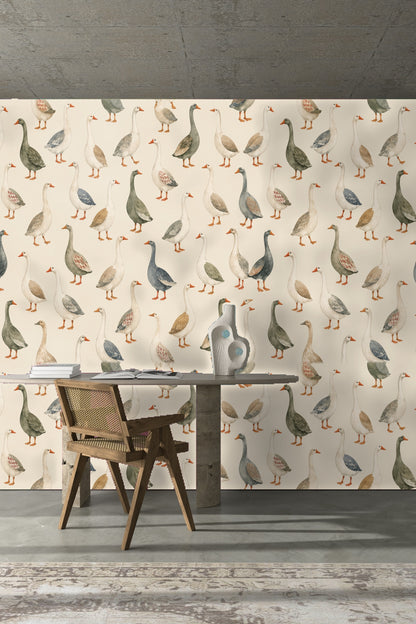 Elegant living area with goose wallpaper contrasted by rich blue upholstery