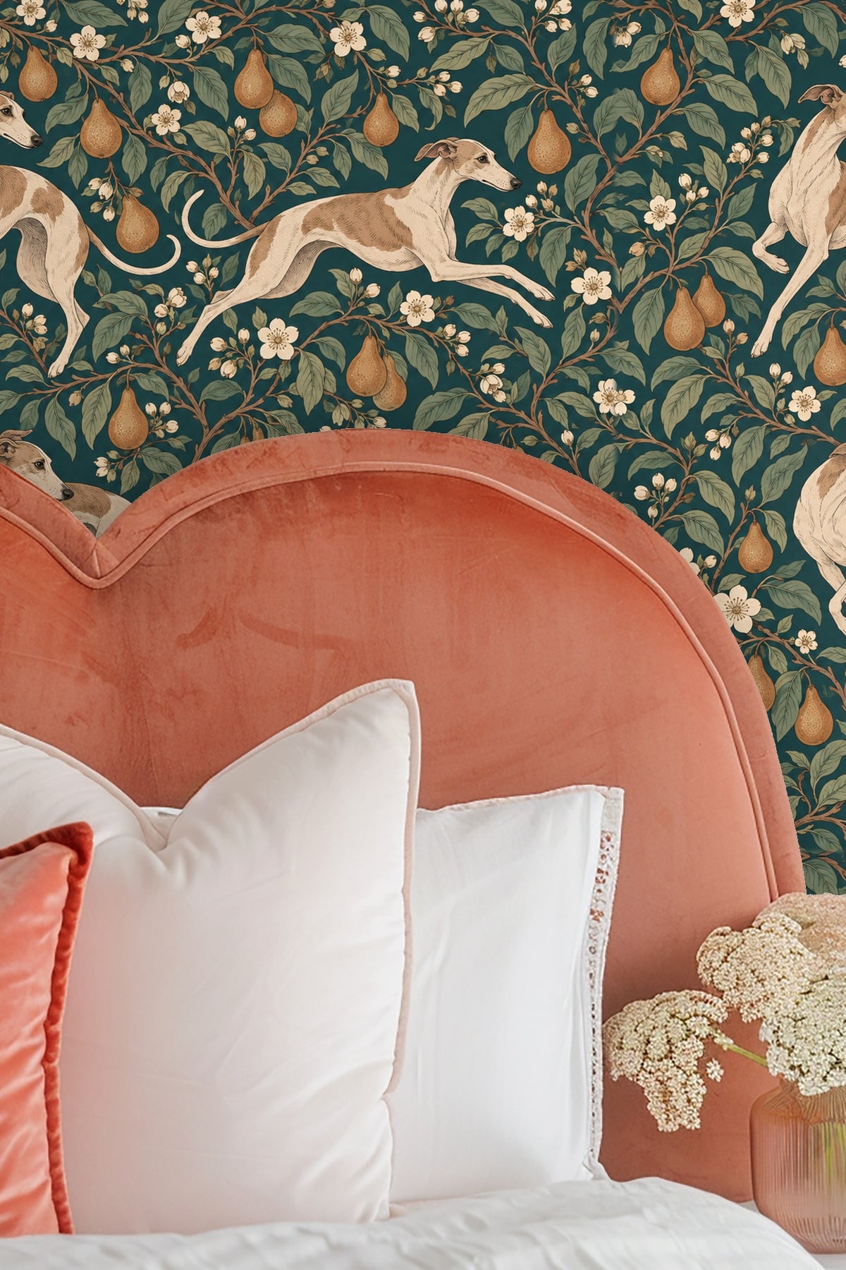 Decorative wallpaper detail featuring finely drawn leaves and fruit with elegant whippets