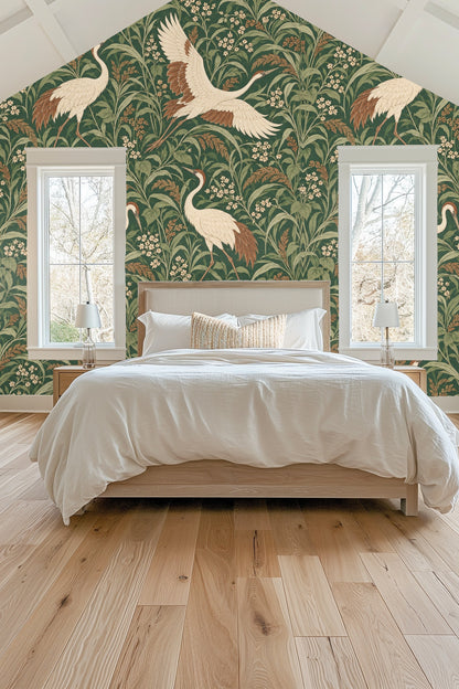 Pattern repeat close-up showing crane details in sepia and ivory on green background