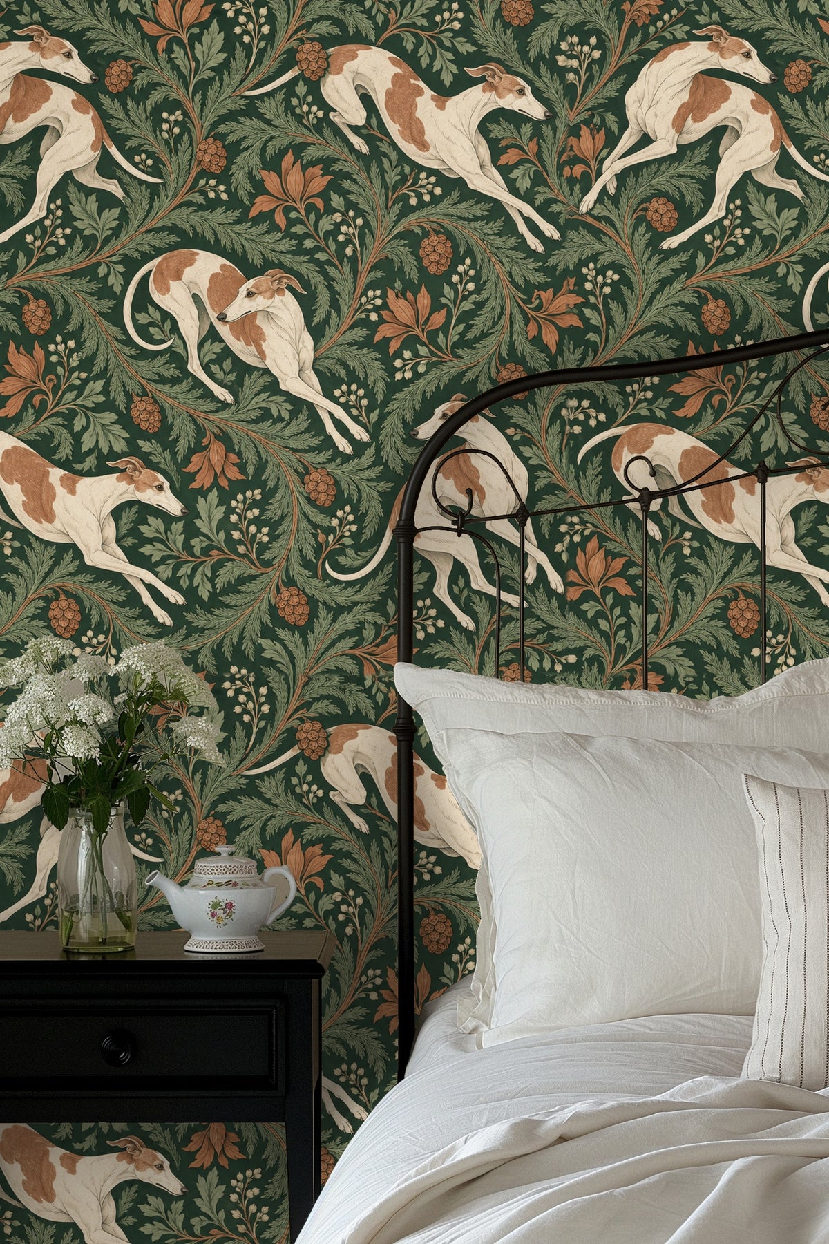 Bathroom medicine cabinet open against wallpaper featuring green laurel and tan whippets