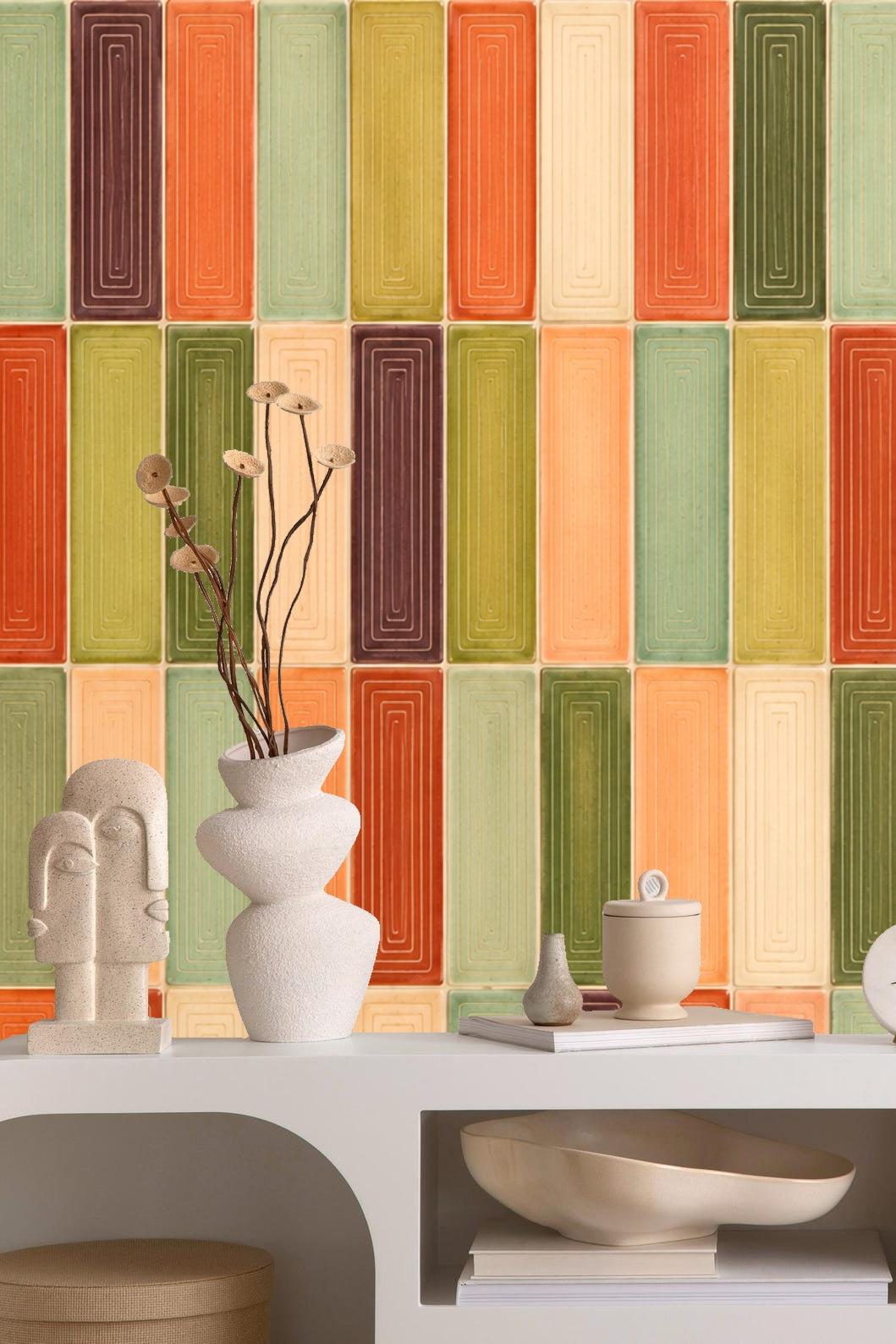 Bedroom wall featuring the colorful tile wallpaper behind the bed with green pillow and modern sconce