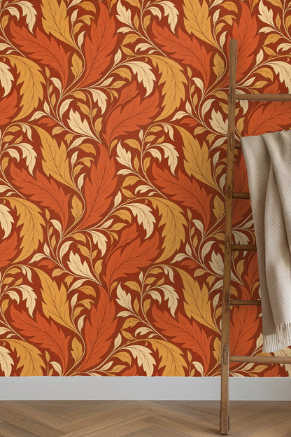 Segment of wallpaper pattern with large curling leaves in burnt orange and beige.