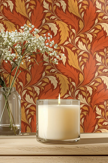 Bathroom medicine cabinet door open showing wallpaper with rich terracotta leaf scroll.