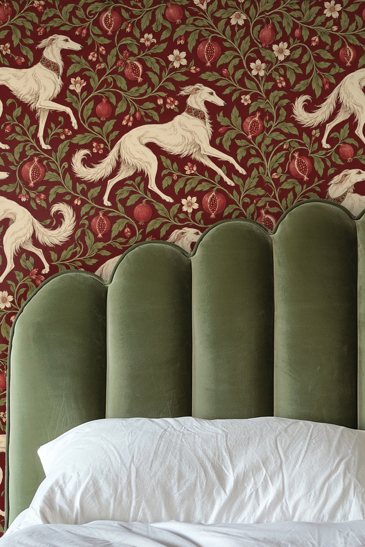 Bathroom vanity wall decorated with wallpaper of cream whippets running through stylized pomegranate foliage on a crimson backdrop