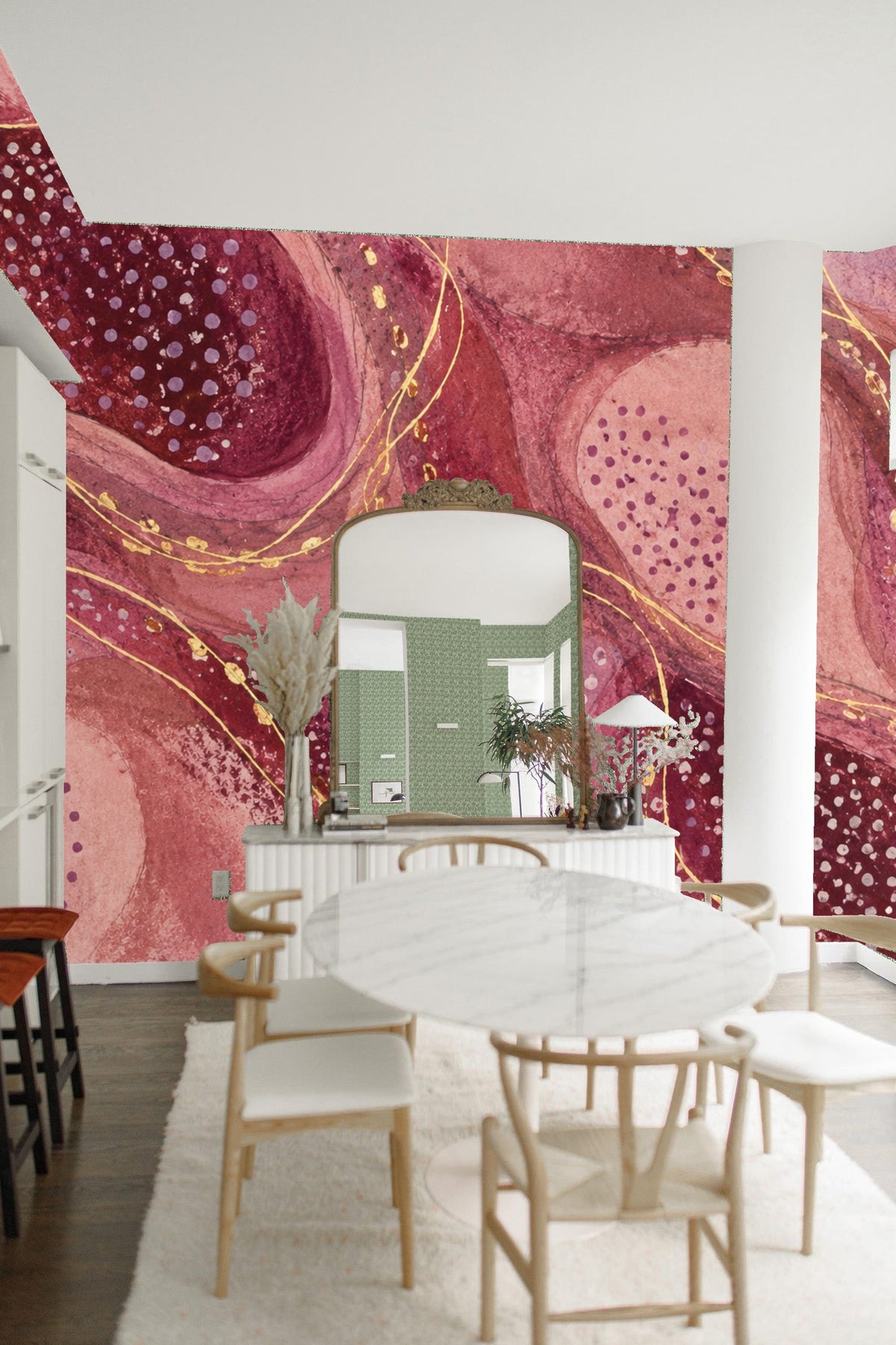 Close-up of rounded, layered shapes in plum and pink tones with dotted patterns and gold lines