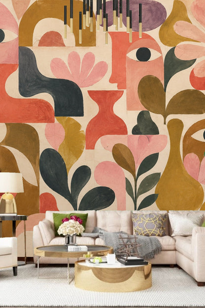 Close-up detail of abstract terracotta faces and leaves wallpaper in a children’s room setting.