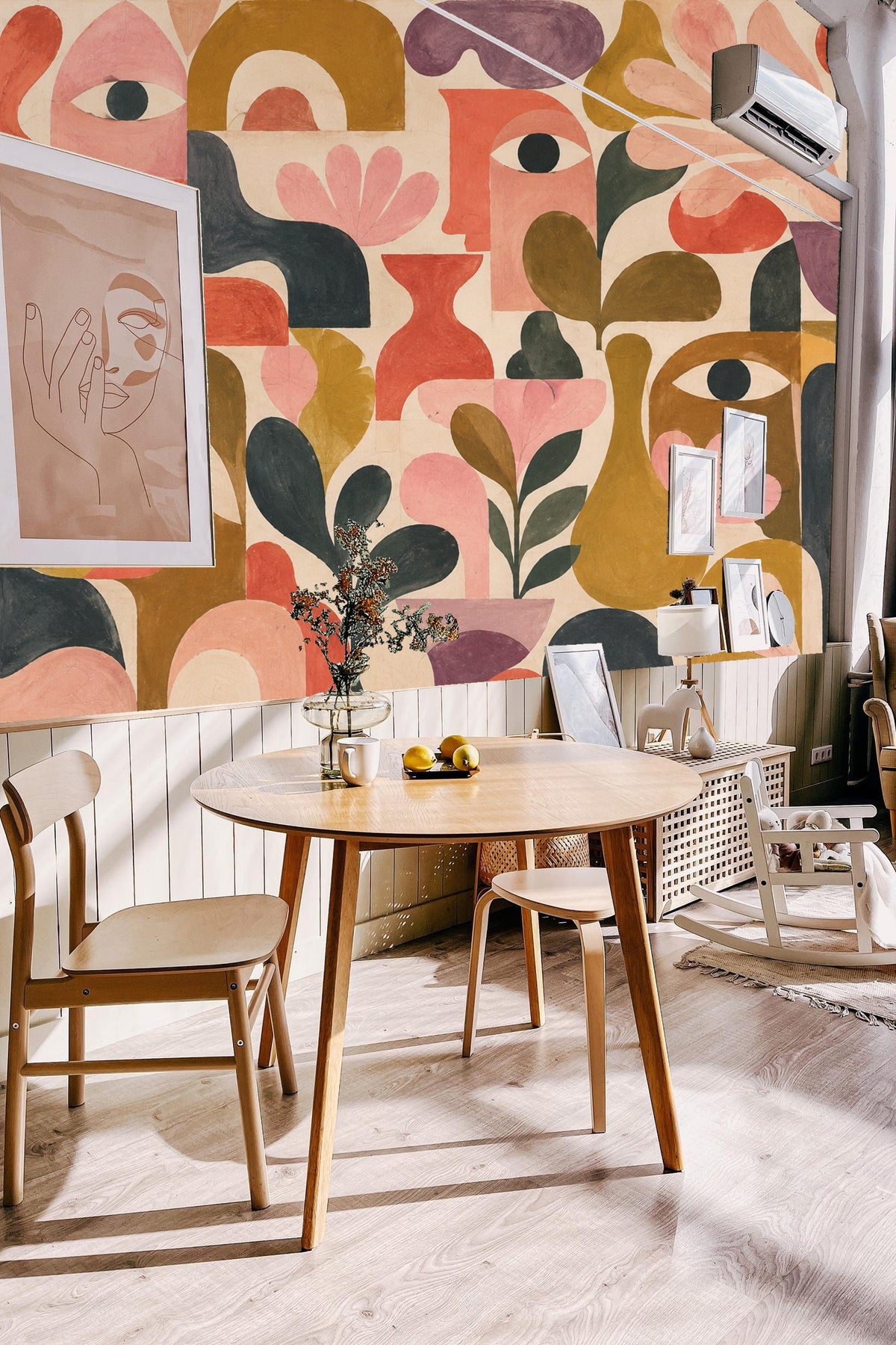 Abstracted Faces & Botanicals wallpaper shown in an interior setting