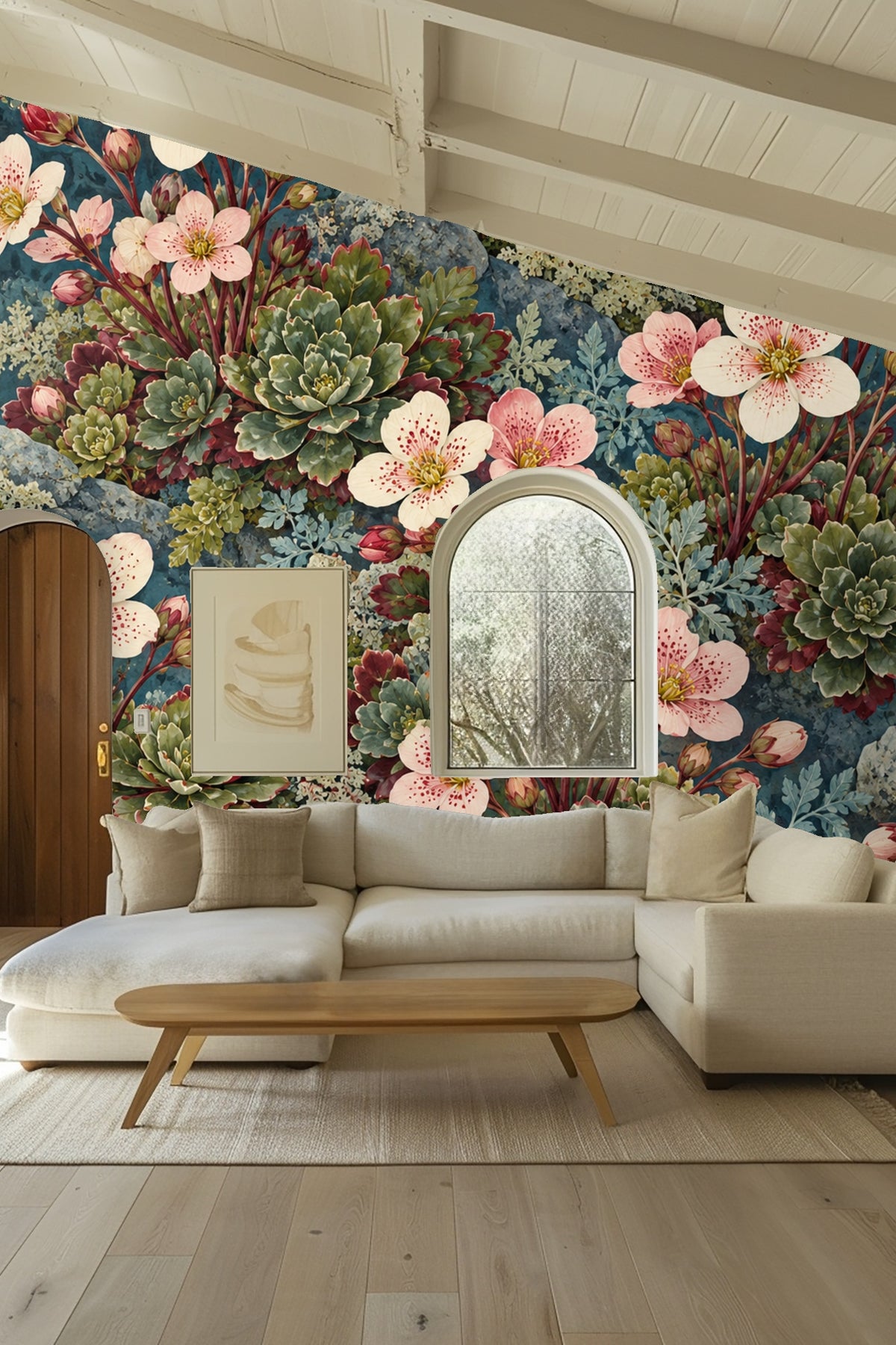 Bedroom wall decorated with floral wallpaper showcasing pink speckled blossoms and succulents behind beige bed and nightstand