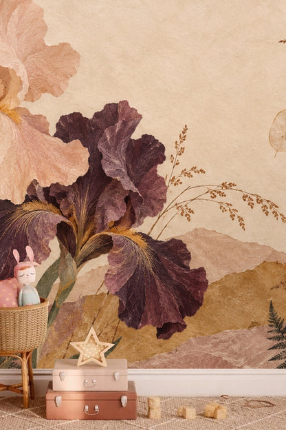 Close-up of muted purple and peach iris flowers with textured petals on wallpaper