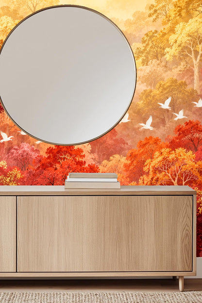 Nursery room with sloped ceiling featuring warm autumn forest wallpaper in reds and yellows with white birds flying, paired with white and r
