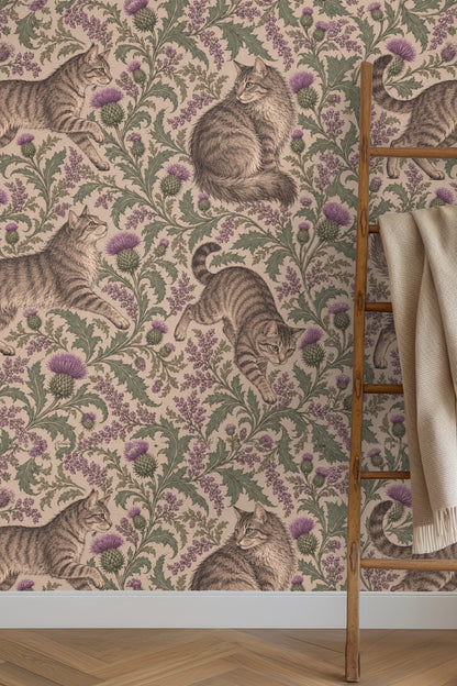Pattern repeat showing tabby cats among thistle flowers in mauve and green on beige background
