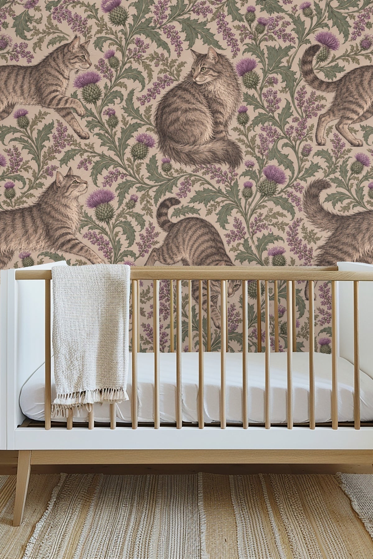 Tabby cat sitting surrounded by mauve thistle blooms and green leaves on beige background