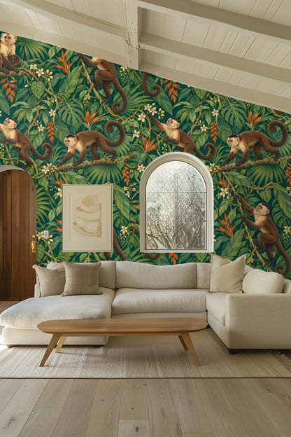 Large palm and monstera leaves as part of wallpaper botanical motif
