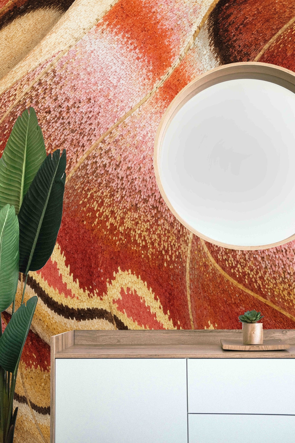 Scaled wall installation in a nursery setting with wallpaper as main feature.