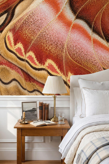 Interior bedroom scene featuring tuned earthwaves wallpaper behind a wooden side table and lamp.