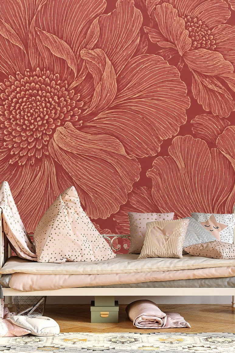 Interior view of red floral wallpaper with natural light highlighting raised flower details