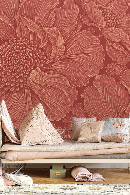 Interior view of red floral wallpaper with natural light highlighting raised flower details