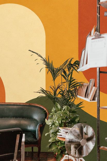 Bedroom corner with the mural wallpaper, decorated with modern light fixture and minimal furnishings.