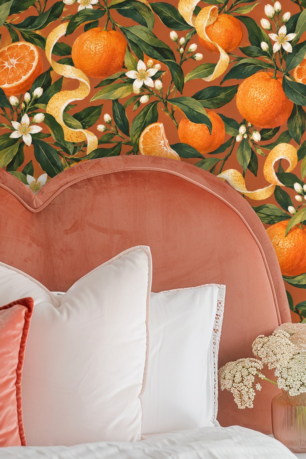 Scene showing wallpaper detail behind light wooden furniture and cream sofa