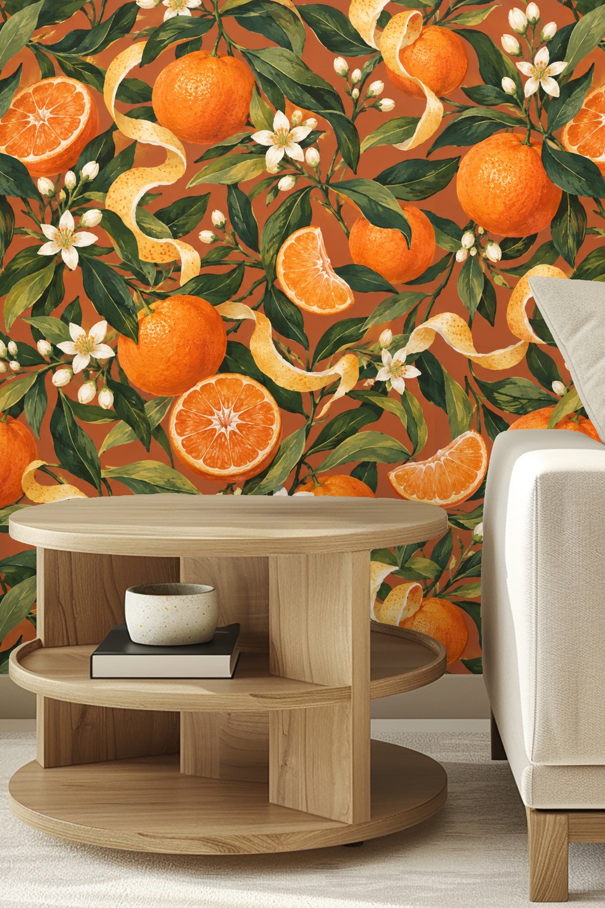 Living room corner with orange botanical patterned wallpaper behind sofa and wooden table