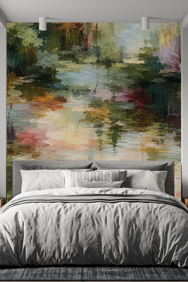 Living room with a pink armchair in front of a large textured brushstroke wallpaper mural