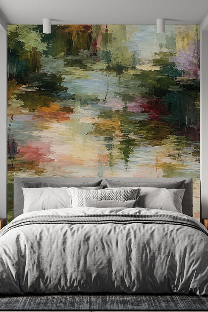Living room with a pink armchair in front of a large textured brushstroke wallpaper mural