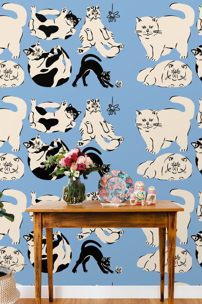 Close-up of cream cat with intense expression from wallpaper