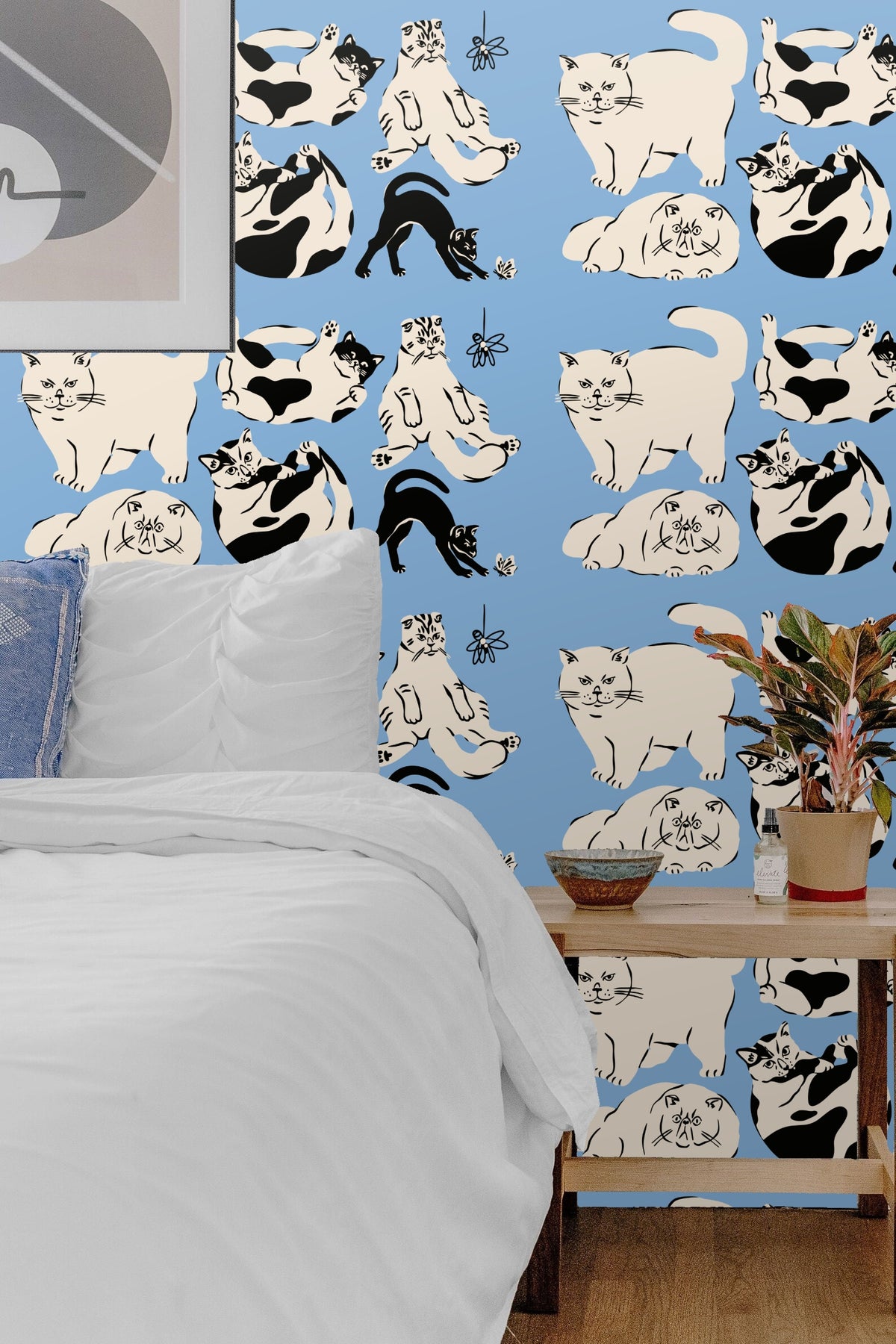 Multiple cat poses arranged in seamless pattern on blue background