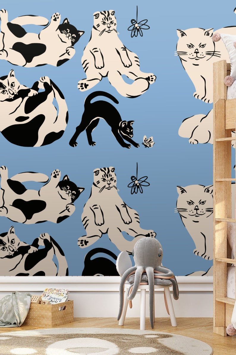 Wallpaper design showing stylized cream and black cats outlined in black on a blue background